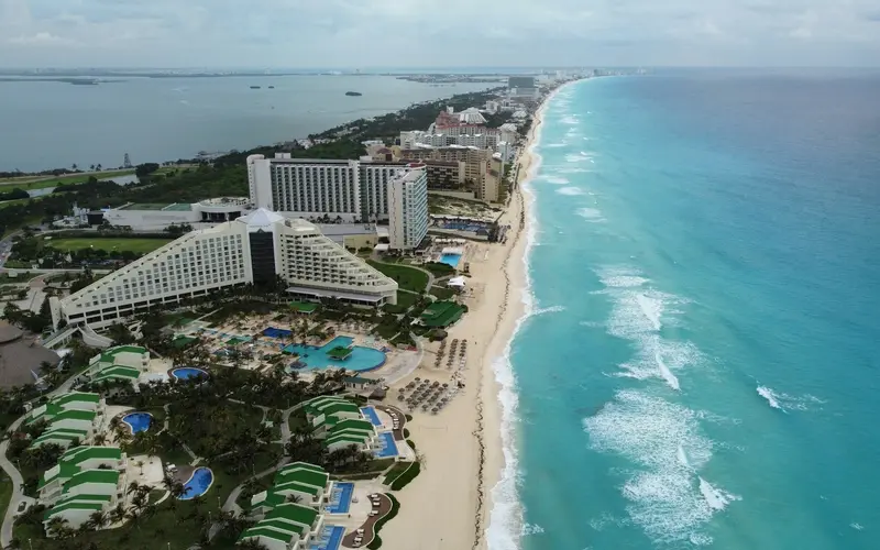 Aerial view of the Cancún Hotel Zone between sea and lagoon